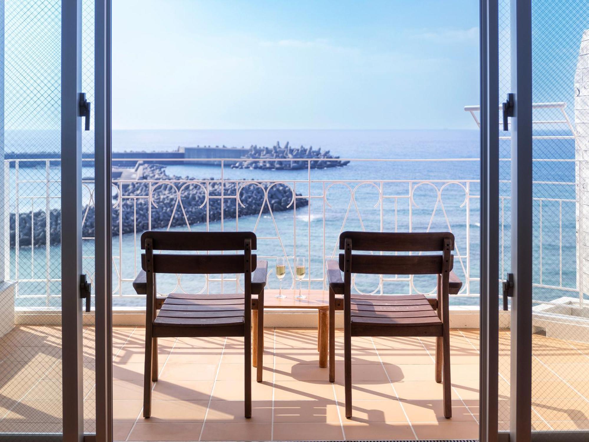 Готель Umi No Terrace Yomitan Toya Екстер'єр фото